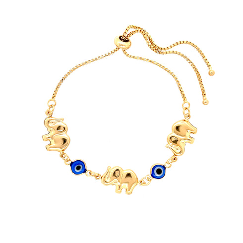 The Blue Evil Eye and Elephant Charms Bracelet, crafted with 14k gold-filled material, features an adjustable chain adorned with three elephant charms and two blue beads reminiscent of an evil eye design, all evenly distributed along the band.